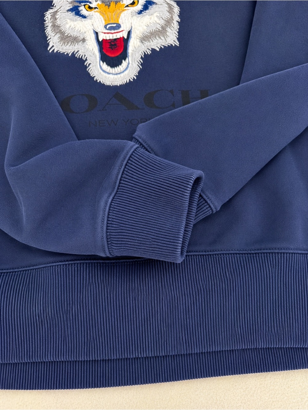 Coach Navy Crewneck Sweater with Embroidered Wolf Motif - Picture 6 of 7